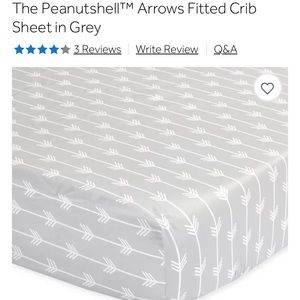 The Peanutshell Arrow Fitted Crib Sheet in Grey